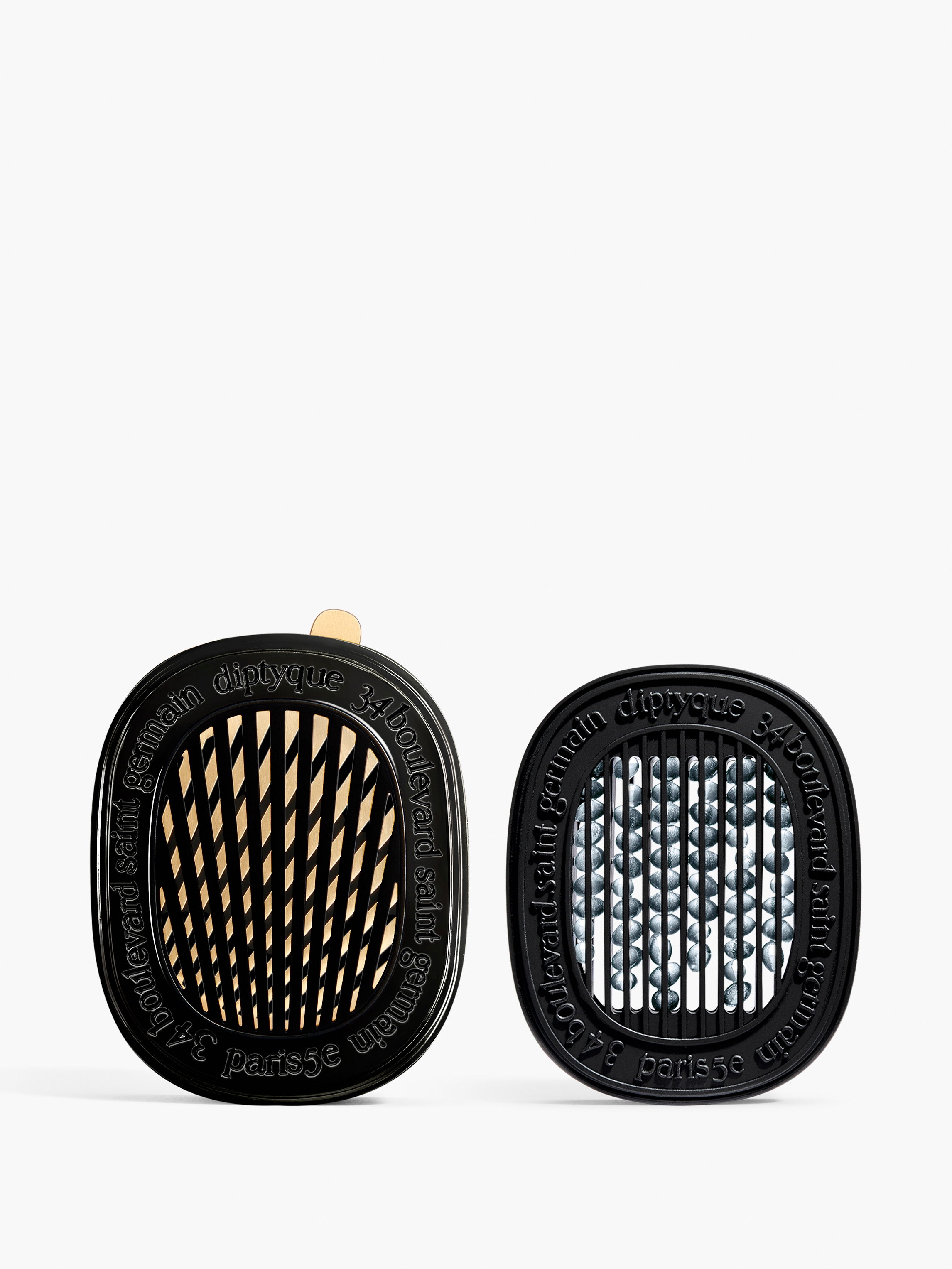 https://www.diptyqueparis.com/media/catalog/product/d/i/diptyque-car-diffuser-with-baies-insert-cardifb-2.jpg?quality=100&bg-color=255,255,255&fit=bounds&height=&width=